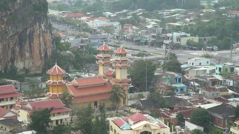 Building next to Marble Mountain Stock Footage 73935933