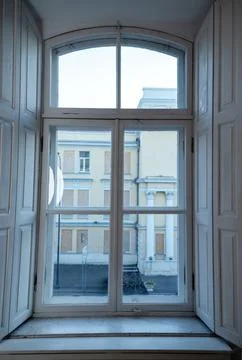 A building next to a window Stock Photos