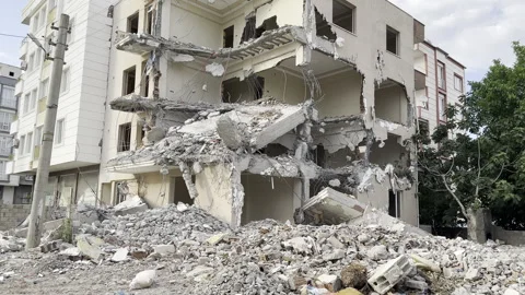 A building or structure that was half destroyed, destroyed Stock Footage 243125708