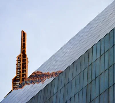 Building with Orange Satelite Structure Behind it Stock Photos