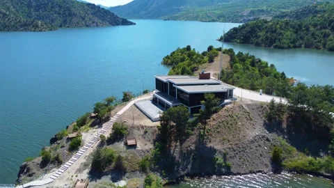 A Building on a Peninsula and Clouds Stock Footage 247957067