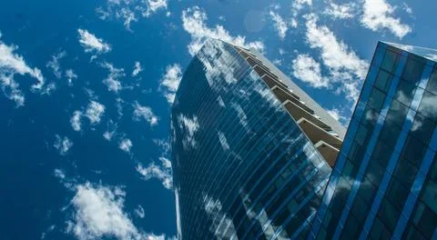 Building in perspective reflects the environment. Stock Photos