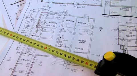 Building plans and tape measure Stock Footage