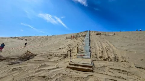 The building process of concrete stairs on the largest European dune Dune du Stock Photos