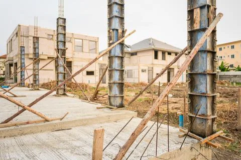 Building process of a house column in construction site on housing project Stock Photos