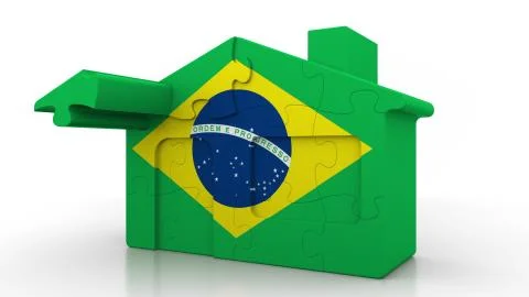Building puzzle house featuring flag of Brazil. Brazilian emigration Ilustración de archivo