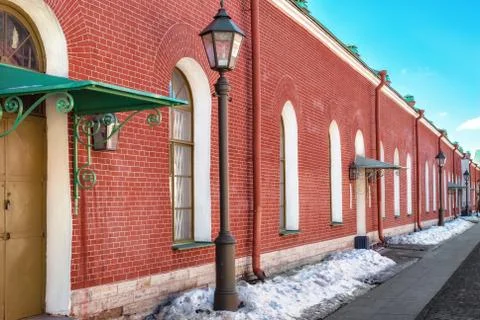 The building is red brick. Stock Photos