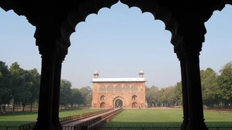 A building at red fort framed by an arch in old delhi- 4K 60p Stock Footage 112283669