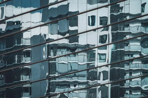 Building reflected on a glass facade Foto stock