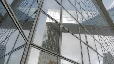 Building reflected on glass skyscraper from left corner in Paris, grey Stock-Footage 110691547