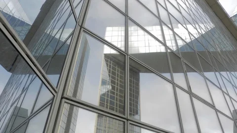 Building reflected on glass skyscraper from left corner in Paris with low camera Stock Footage 110692077