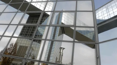 Building reflected on glass skyscraper in Paris, grey skyscraper in Paris, light Stock Footage 110691696