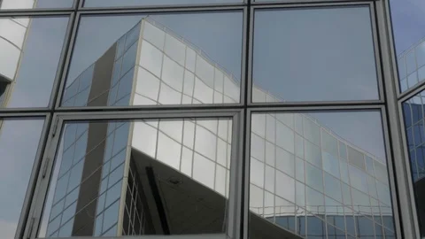 Building reflected on glass skyscraper in Paris, grey skyscraper in Paris, light Видео 110691989