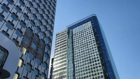 Building reflected on glass skyscraper in Paris, grey skyscraper in Paris, open Stock Footage 208840308