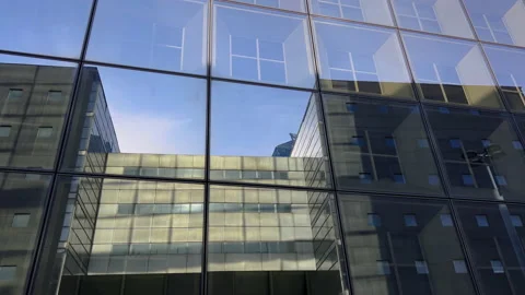 Building reflected on glass skyscraper in Paris, grey skyscraper in Paris, open Stock Footage 236372344