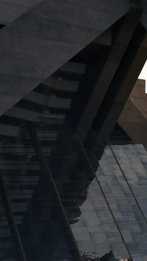 Building reflection in glass during evening hours near urban area Stock Footage 341271006