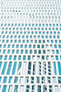 Building reflection in skyscraper windows - modern facade Stock Photos