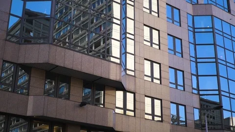 Building Reflection in the Street in Slow Motion 180fps Stock Footage 108506390