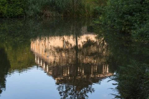Building reflection on a water surface Stock Photos