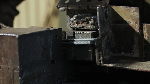 Building reinforcement is cut on a machine Stock Footage 294986861