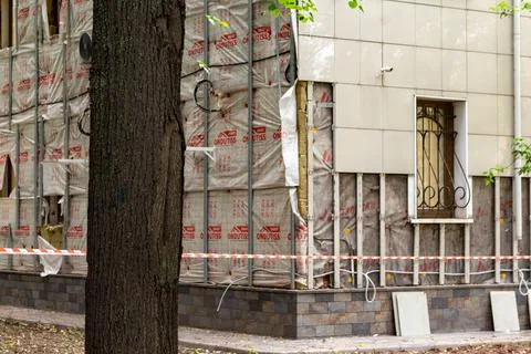 Building renovation process external wall insulation. Russia - 02 August 2026 Stock Photos