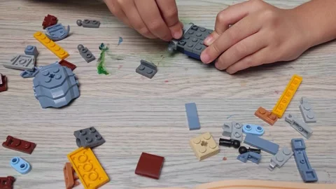 Building a Robot with Blocks Stock Footage 290104753