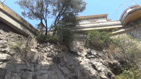 Building, rocks and trees, nice, france Stock Footage 99254844