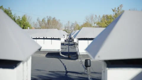 Building roof features dark dense non-slip material covering Видео 332269211