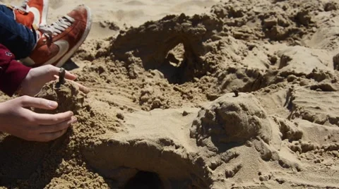 Building sand castle Stock Footage 46075079