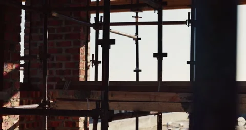 Building, scaffolding or planks on construction site for renovation, engineering Stock Footage 336780715
