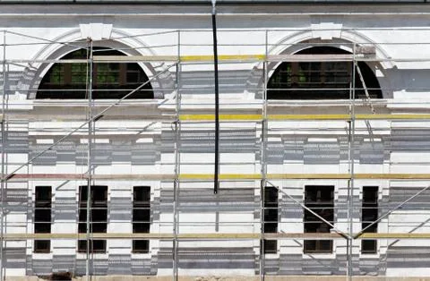 Building in the scaffolding Stock Photos