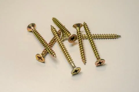 Building screws on a light background Stock Photos