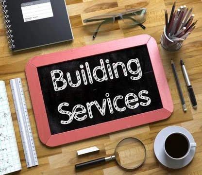Building Services on Small Chalkboard. 3D Illustration Ilustración de archivo