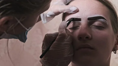 Building the Shape of Eyebrows, Tint Pro... | Stock Video | Pond5