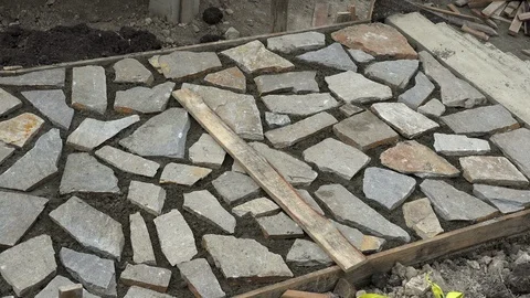Building sidewalk pavement with stone blocks Video stock 96478744