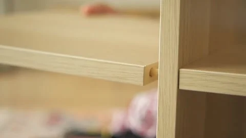 Building a simple wooden shelf with basic tools at home Vídeos de archivo 330514939