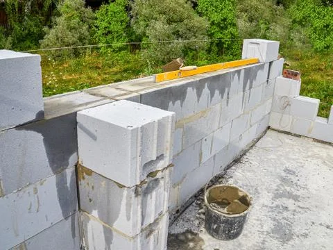 Building site of a house made of blocks colorful Stock Photos