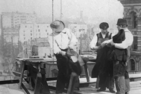 Building Skyscrapers Archival - fighting on work site 1906 Stock Footage 246226084