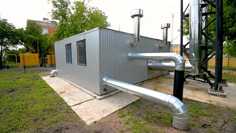 The building of a small autonomous boiler house in an urban area. Concept Stock Footage 285511229