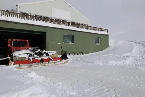 A building with snow on the ground Stock Photos