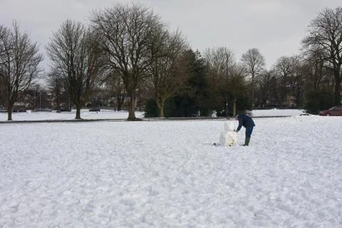 Building a snowman Stock Photos