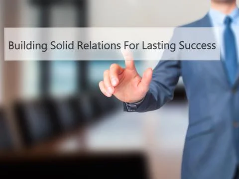 Building Solid Relations For Lasting Success -  Businessman click on virtual  Fotos de archivo