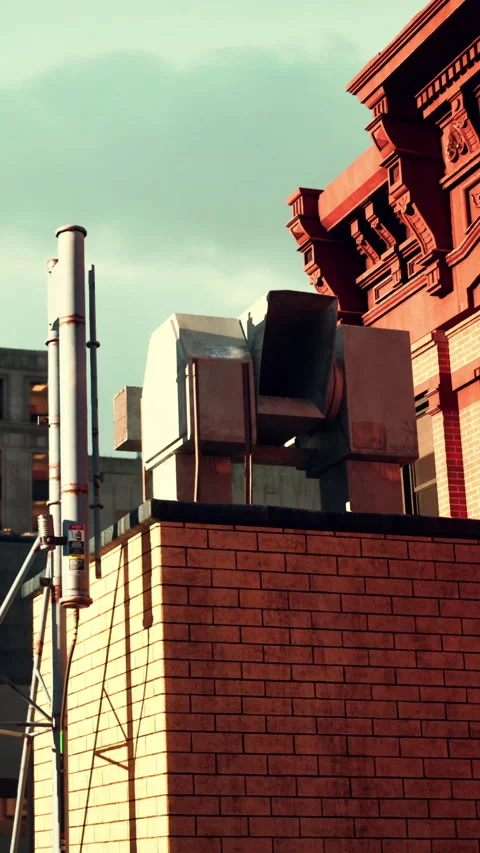 Building structure with air ducts and utility poles in urban setting Stock Footage 342174097