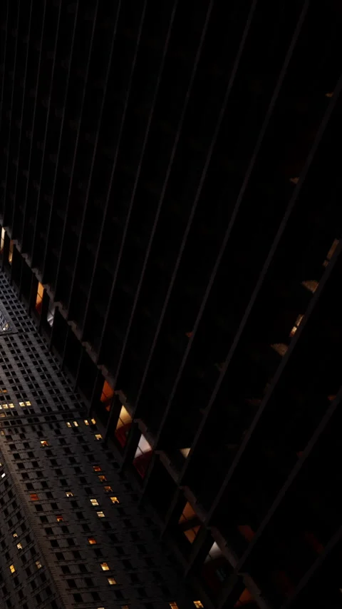 Building structure with light patterns in urban area at night Stock Footage 335100412
