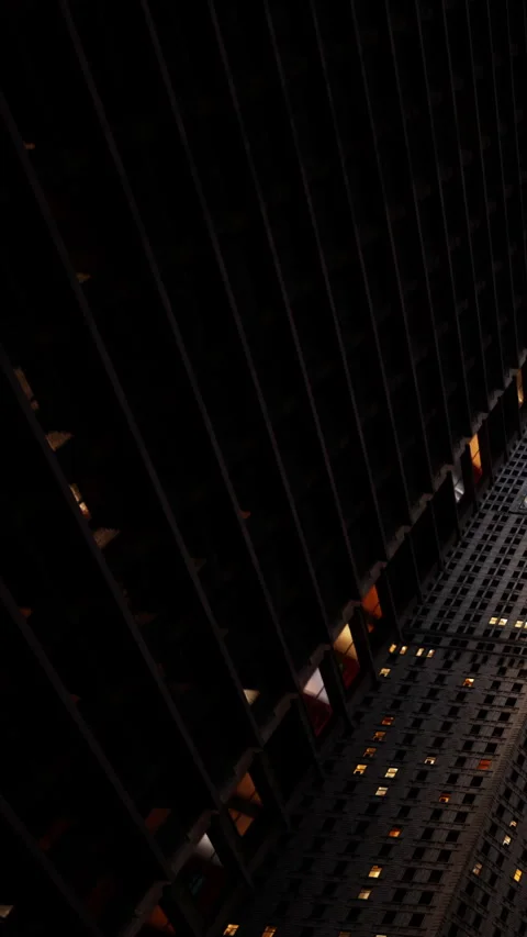 Building structure with light reflections at night in a city setting Stock Footage 342189356