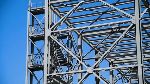 A building structure made of metal beams forming the frame of a building or.. Stock Footage 328830530