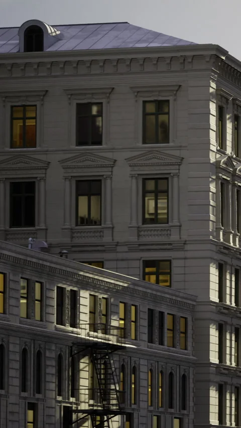 Building structure with windows and fire escape during evening hours Stock Footage 333564544