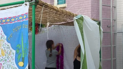 Building Sukkah Stock Footage 55609034