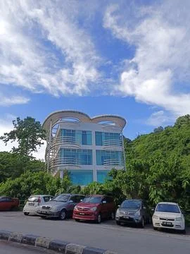 Building surrounded by forest Foto stock