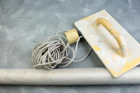 Building tools on the gray concrete background. Copy space. Top view.. Stock Photos